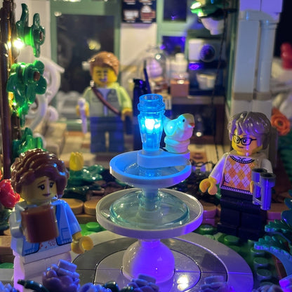 Lyskit til LEGO® 21353 The Botanical Garden med LED-lys, der fremhæver planter, blomster og detaljer i den botaniske have.